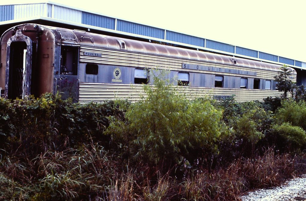 Southern Rwy Tombigbee River (10-6 sleeper). Car privately owned. Ownkr started gutting car to turn into sleeper lounge but never completed. All windows on this side broken out. Later car was moved to Clanton, Al. as part of a restaurant which burned. Rem